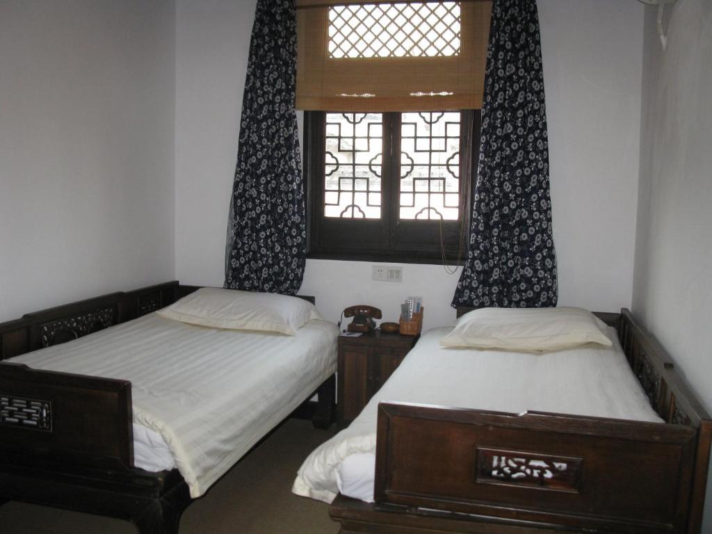 XI Di Travel Lodge Yi (Anhui) Room photo
